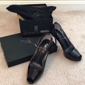 Giuseppe Zanotti hidden platform sandals.